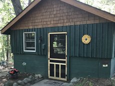 The Angler Cottage exterior Moonlight bay resort traverse city