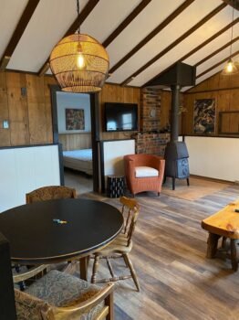 Cottage #2 table and fireplace at Moonlight Bay on Spider Lake