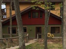 The Moose Cottage exterior Moonlight bay resort traverse city